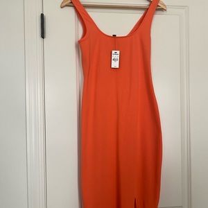 Orange Express knee length dress. Brand new
